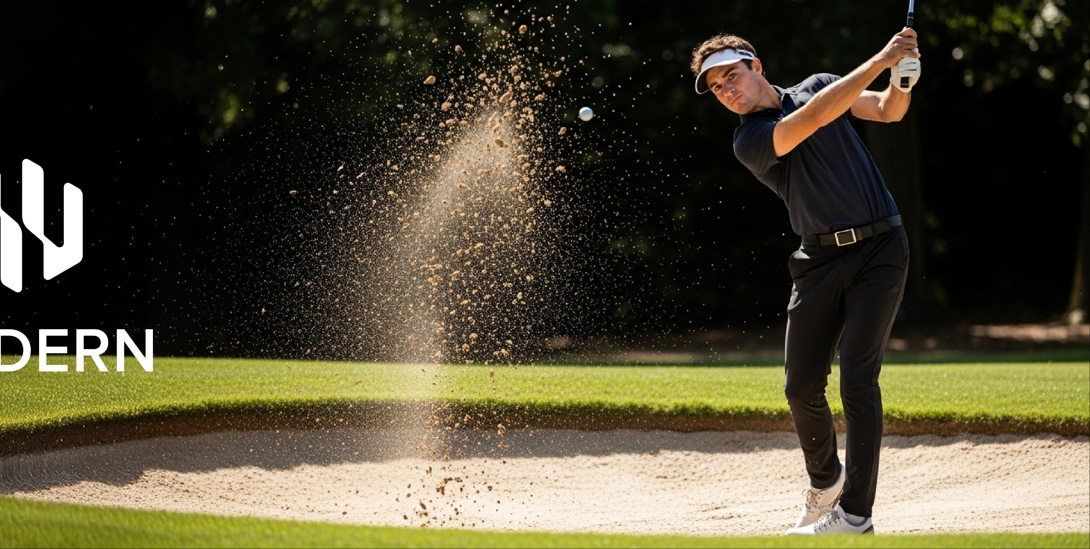 Golfer hitting out of a sand trap with HISDERN logo in the background