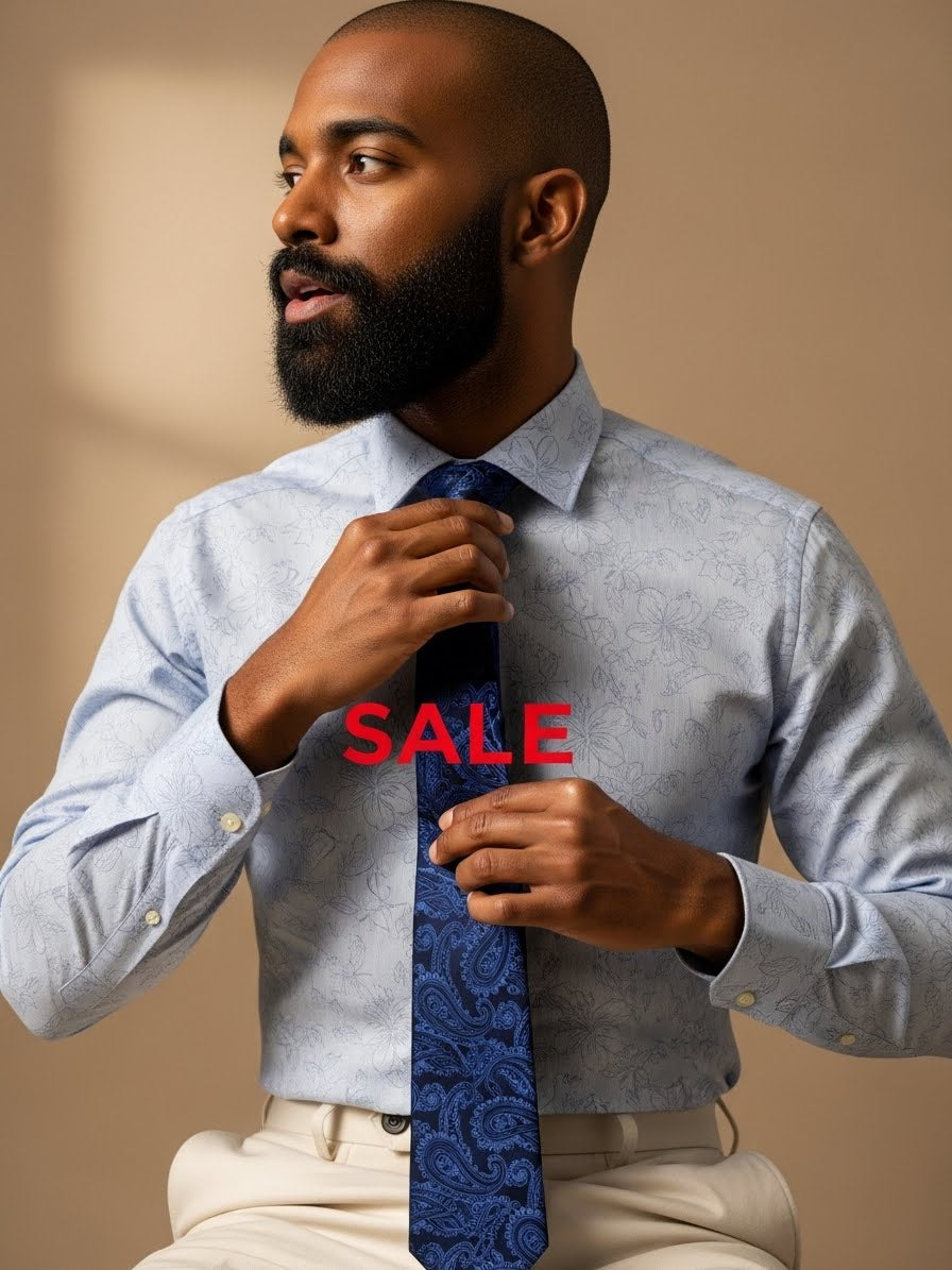 Man adjusting a blue tie with 'SALE' text on a beige background